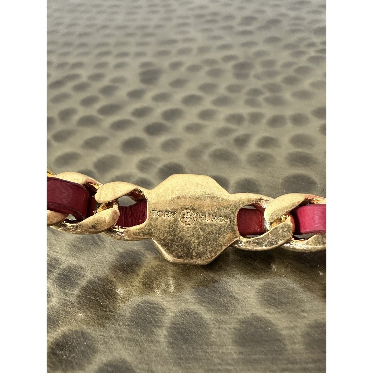 Tory Burch Gold Tone Chain Bracelet with Red Leather Inlay